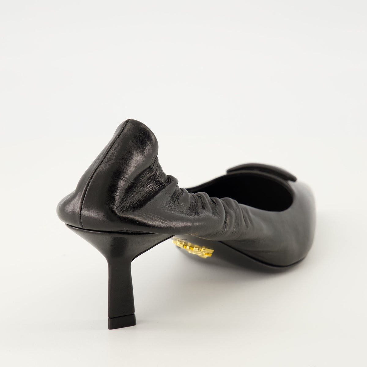 Worn Leather Pumps
